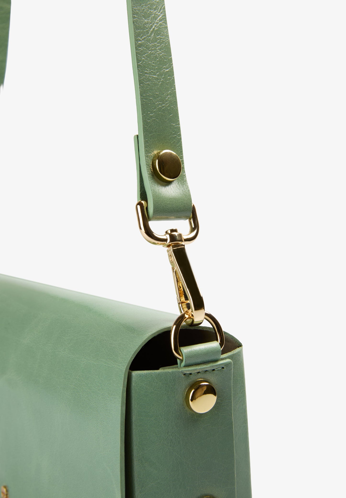 BOLSA MINI EM PELE COM TACHAS