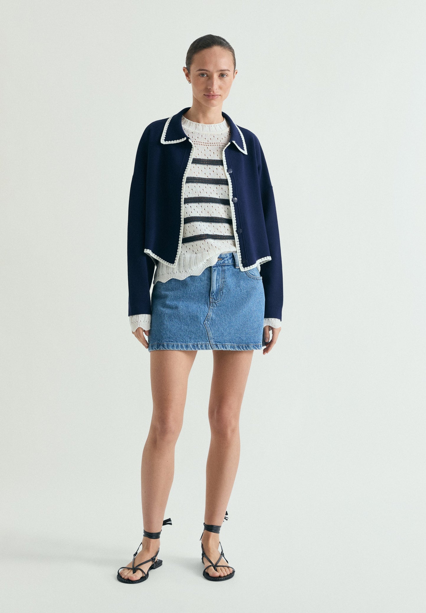 SWEATER DE MALHA ÀS RISCAS