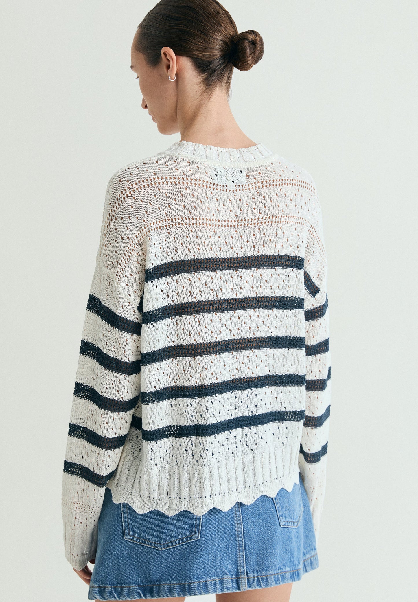SWEATER DE MALHA ÀS RISCAS