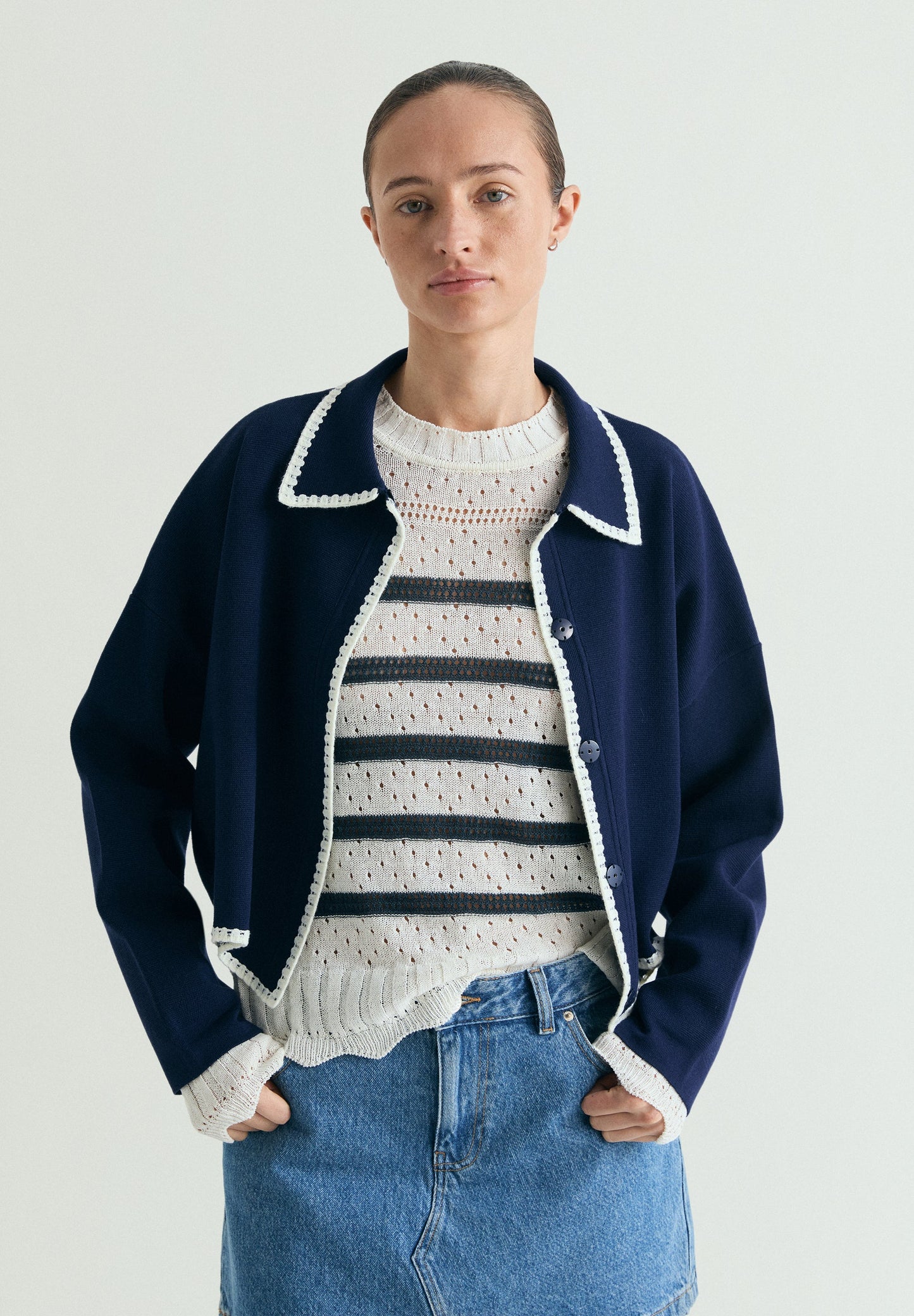 SWEATER DE MALHA ÀS RISCAS