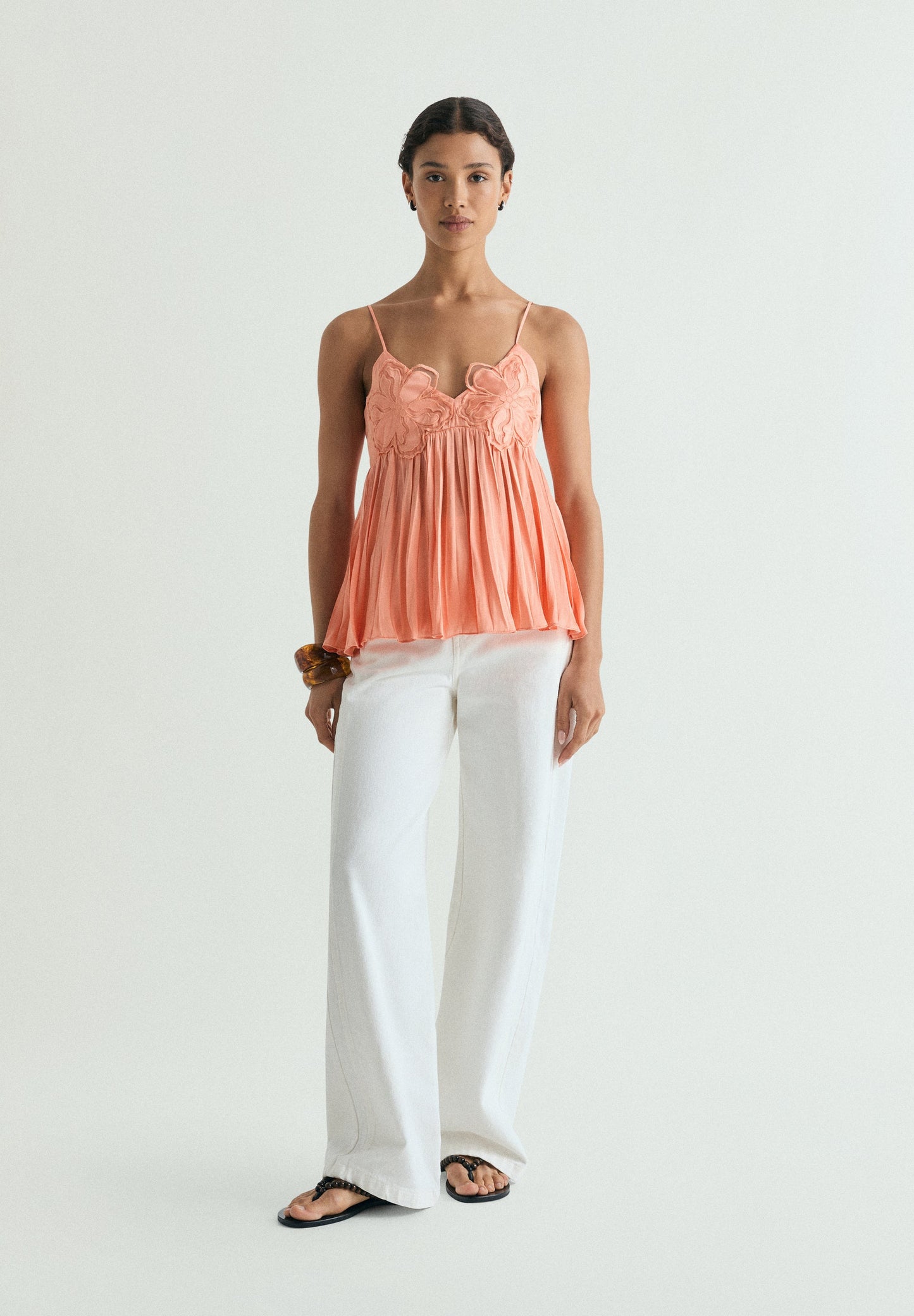 TOP COM PORMENOR FLORAL
