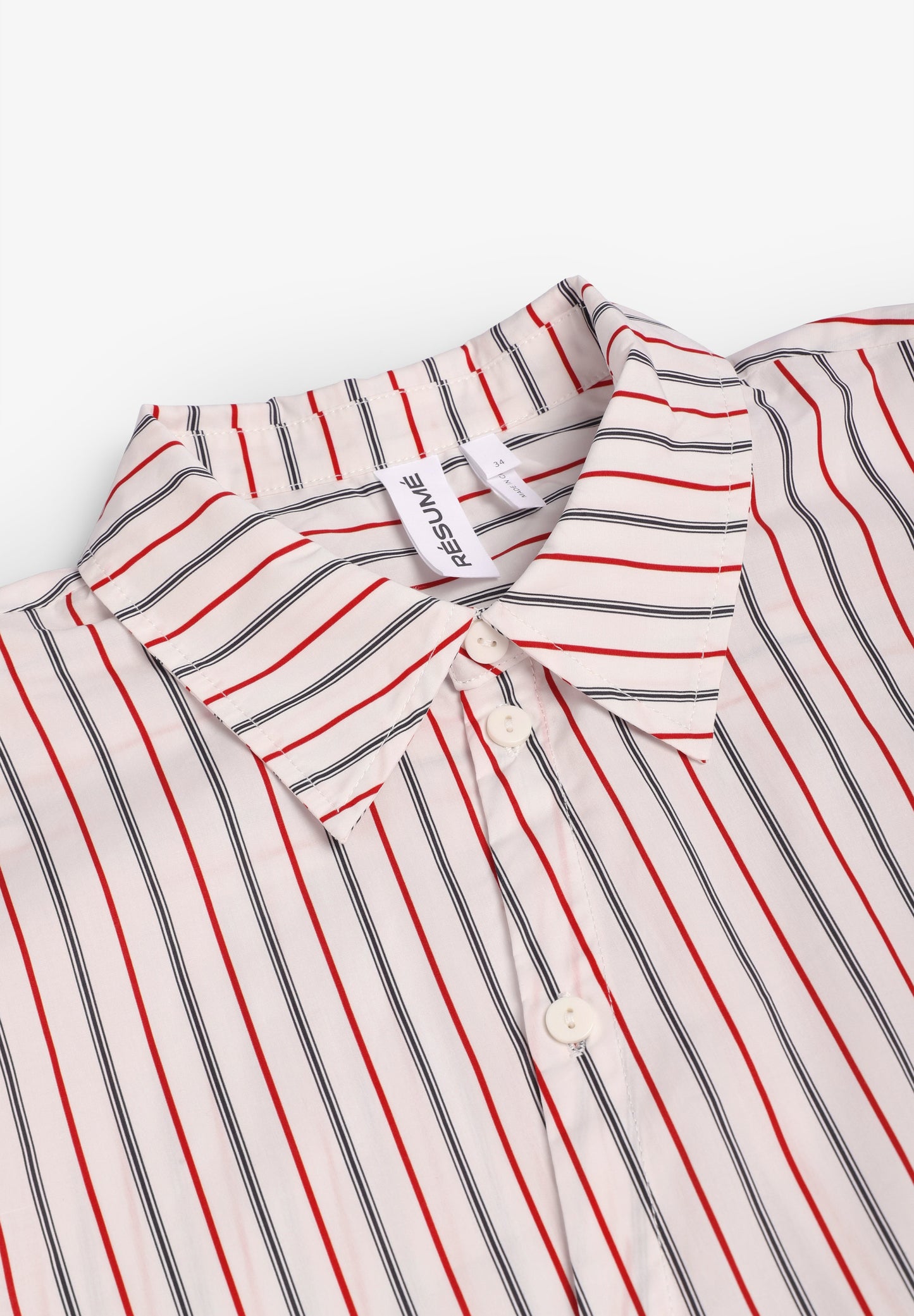 RÉSUMÉ | CAMISA HANNYRS