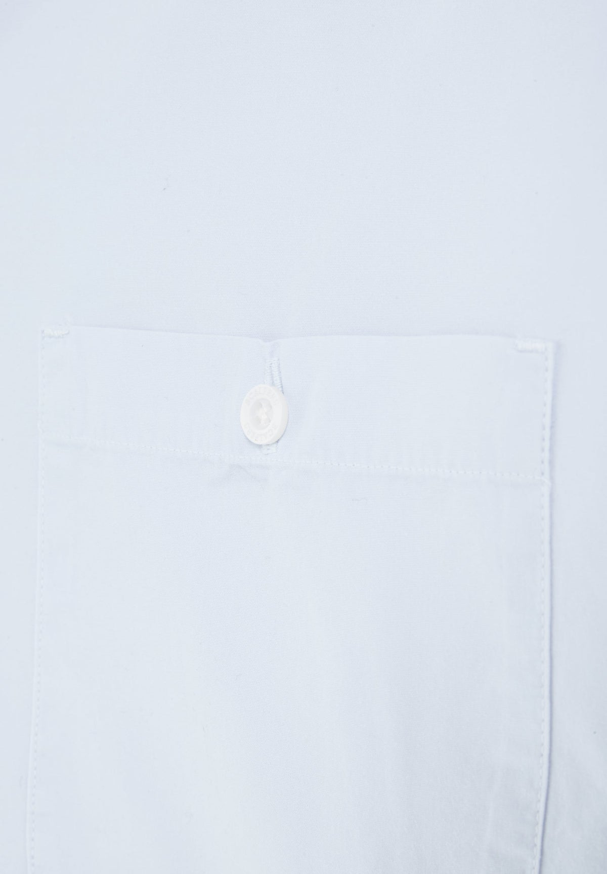 CAMISA COM BOLSOS ABOTOADOS