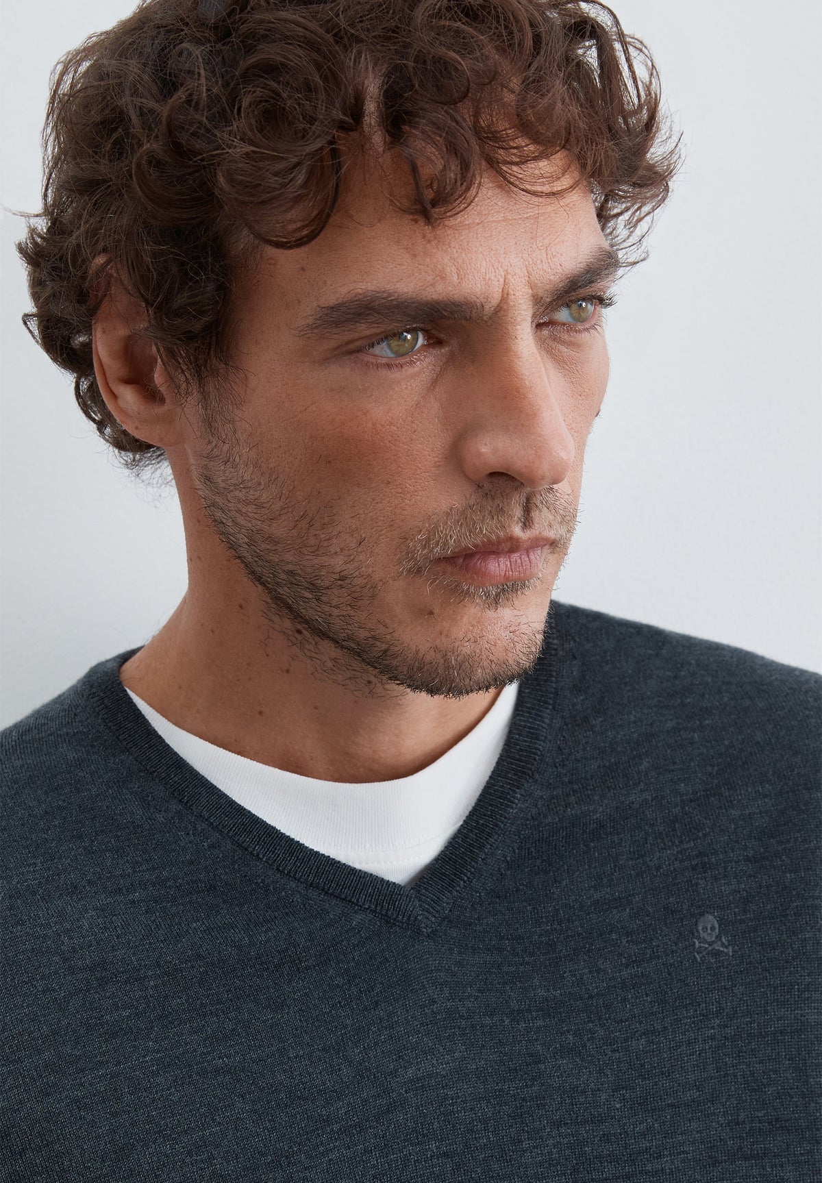 SWEATER DE LÃ COM DECOTE EM V