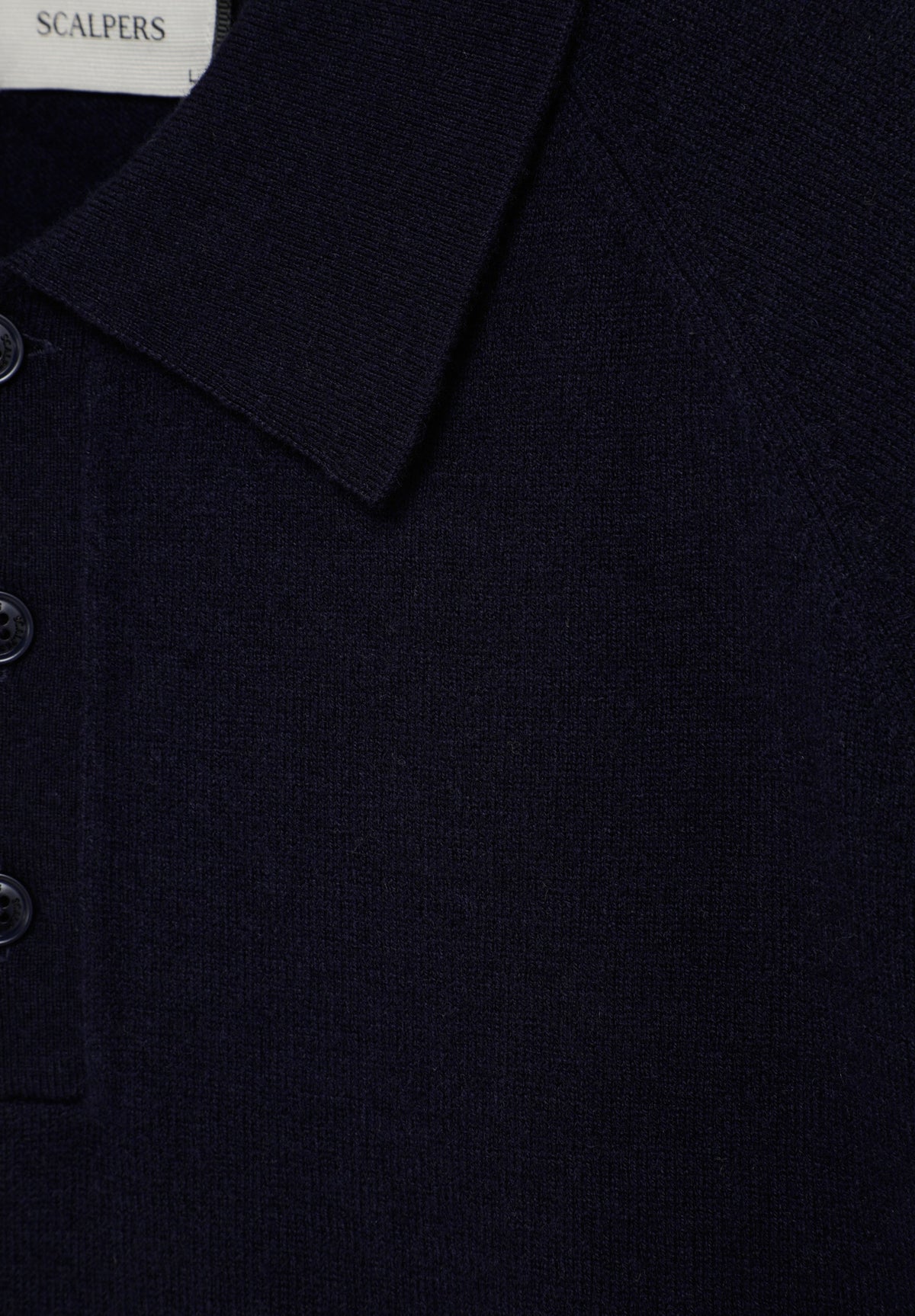 SWEATER DE LÃ MERINO COM GOLA TIPO CAMISA POLO