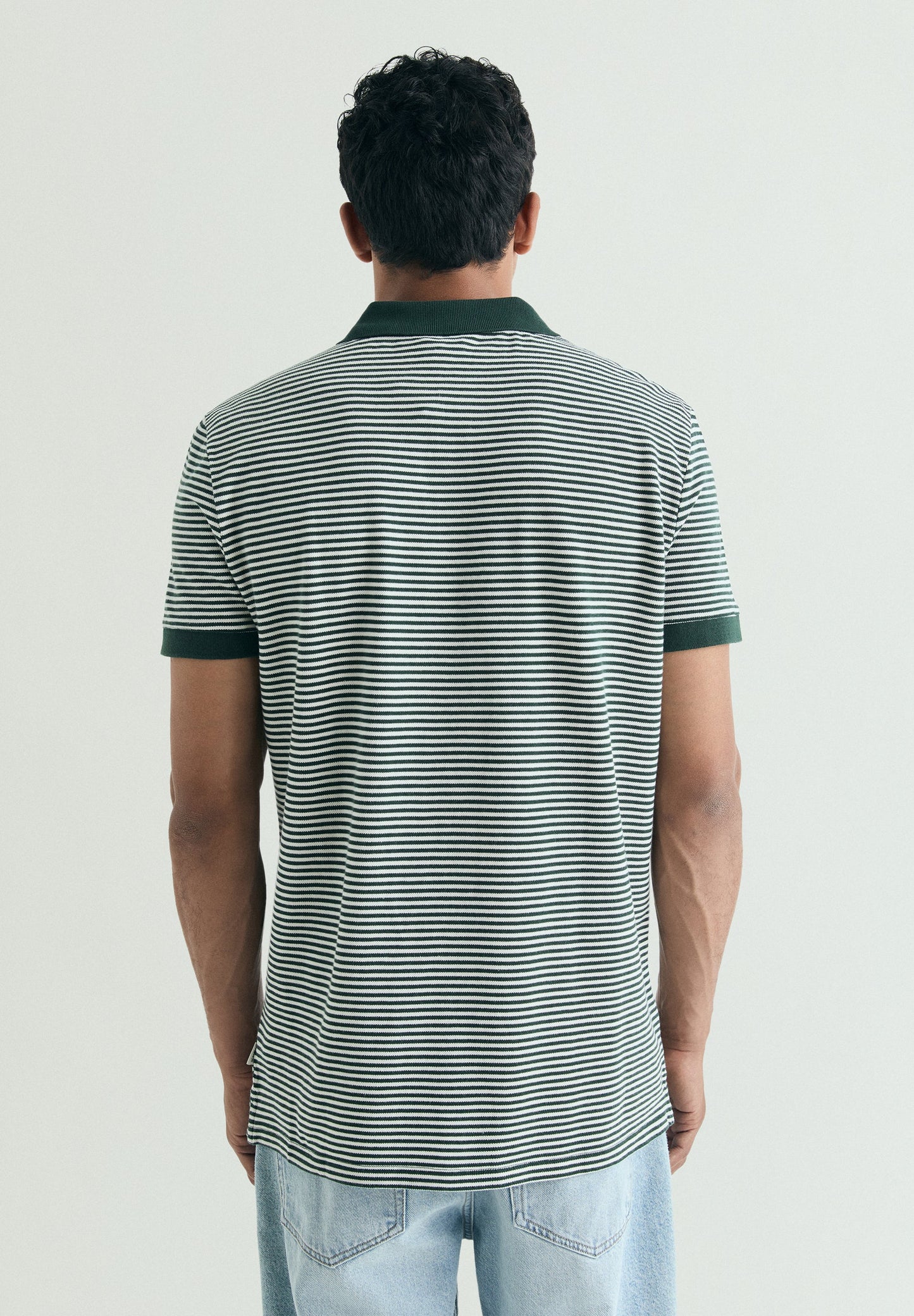 CAMISA POLO ÀS RISCAS A CONTRASTAR