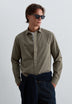 CAMISA RELAXED FIT COM BOLSOS