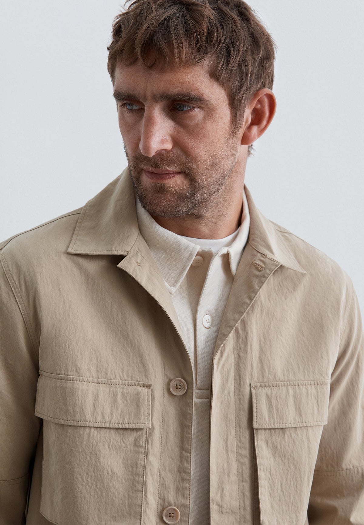 CAMISA COMPRIDA TÉCNICA COM BOLSOS