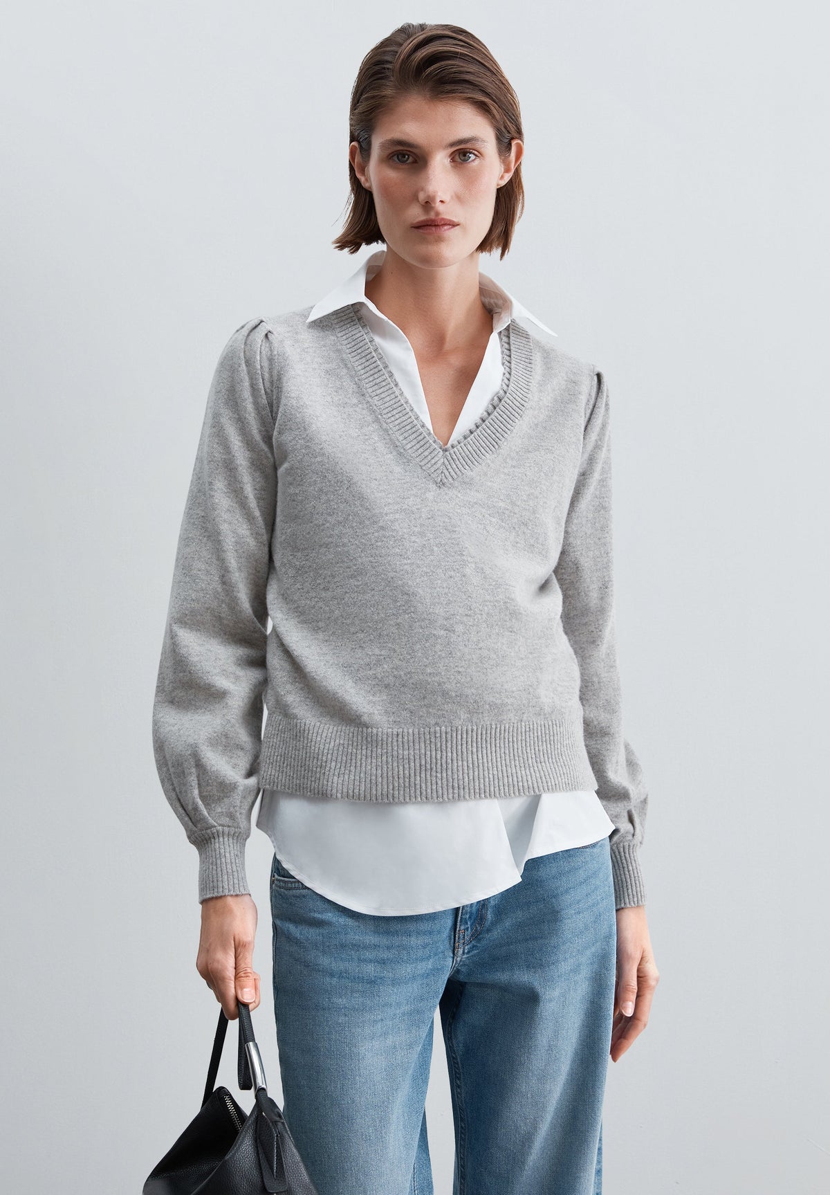 SWEATER DE LÃ COM DECOTE EM V