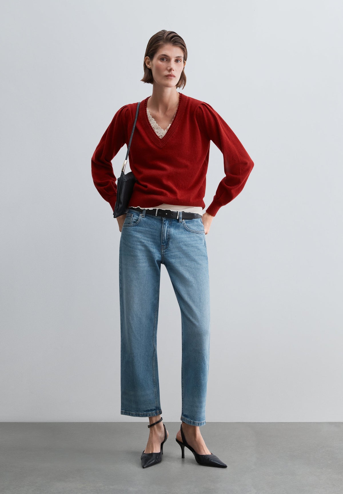 SWEATER DE LÃ COM DECOTE EM V