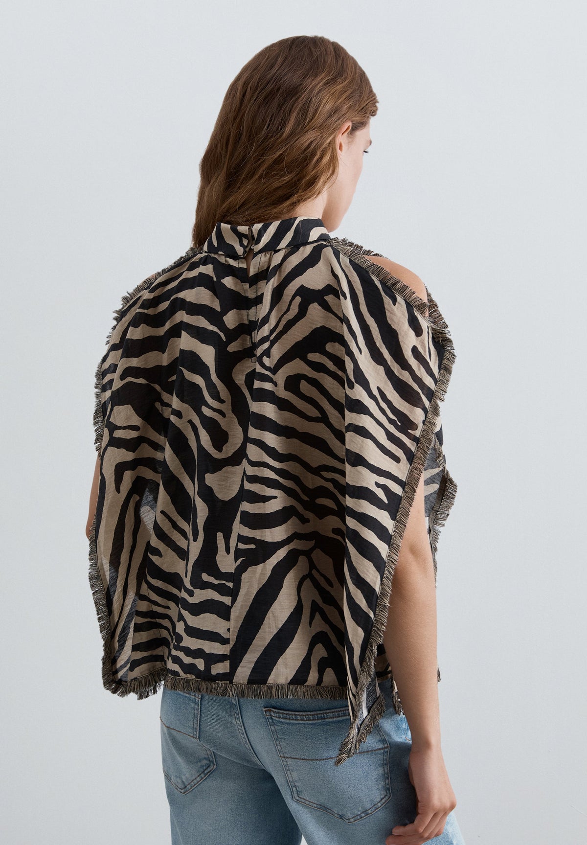 TOP COM FRANJAS E ESTAMPADO ANIMAL