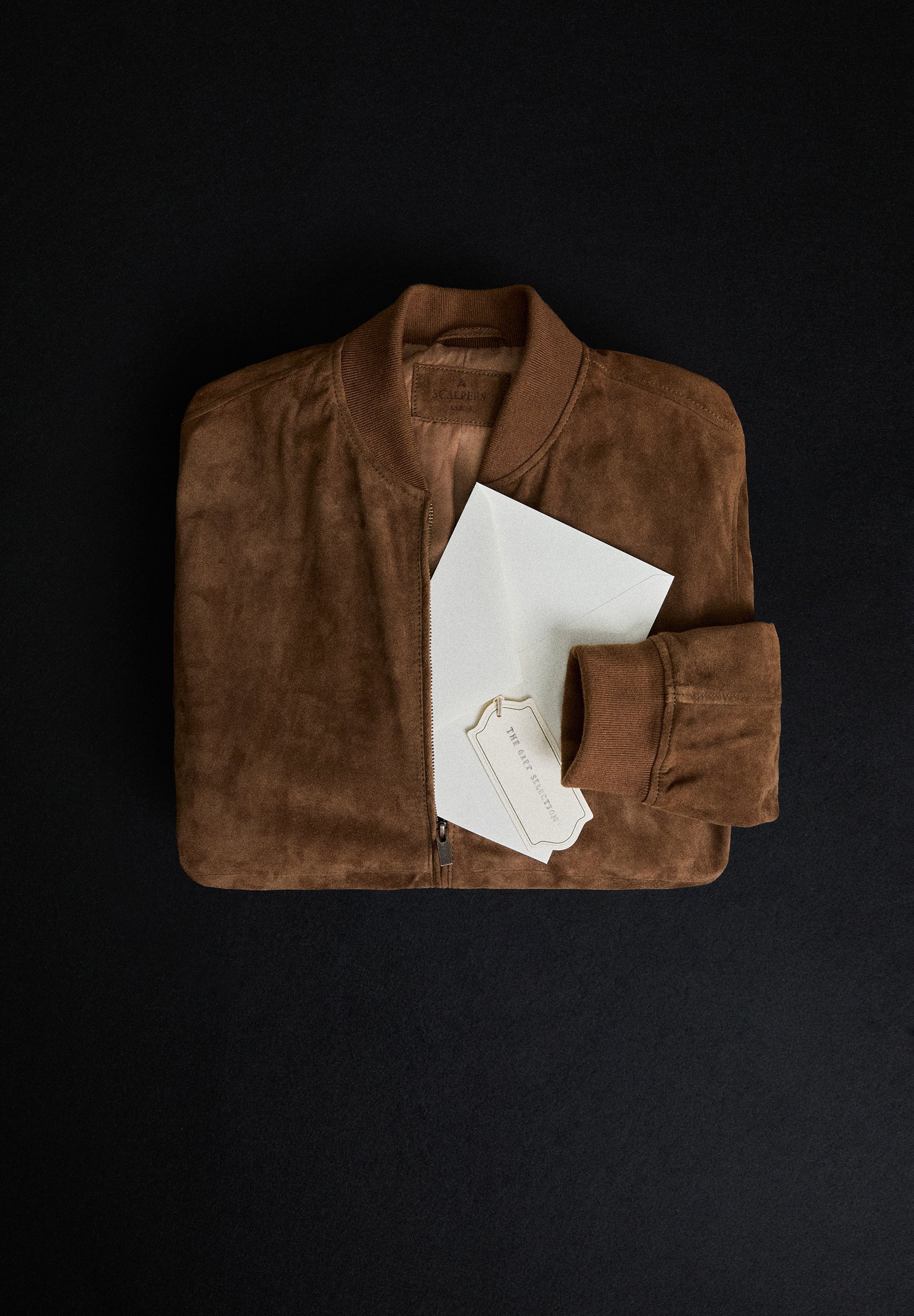 CASACO BOMBER EM PELE