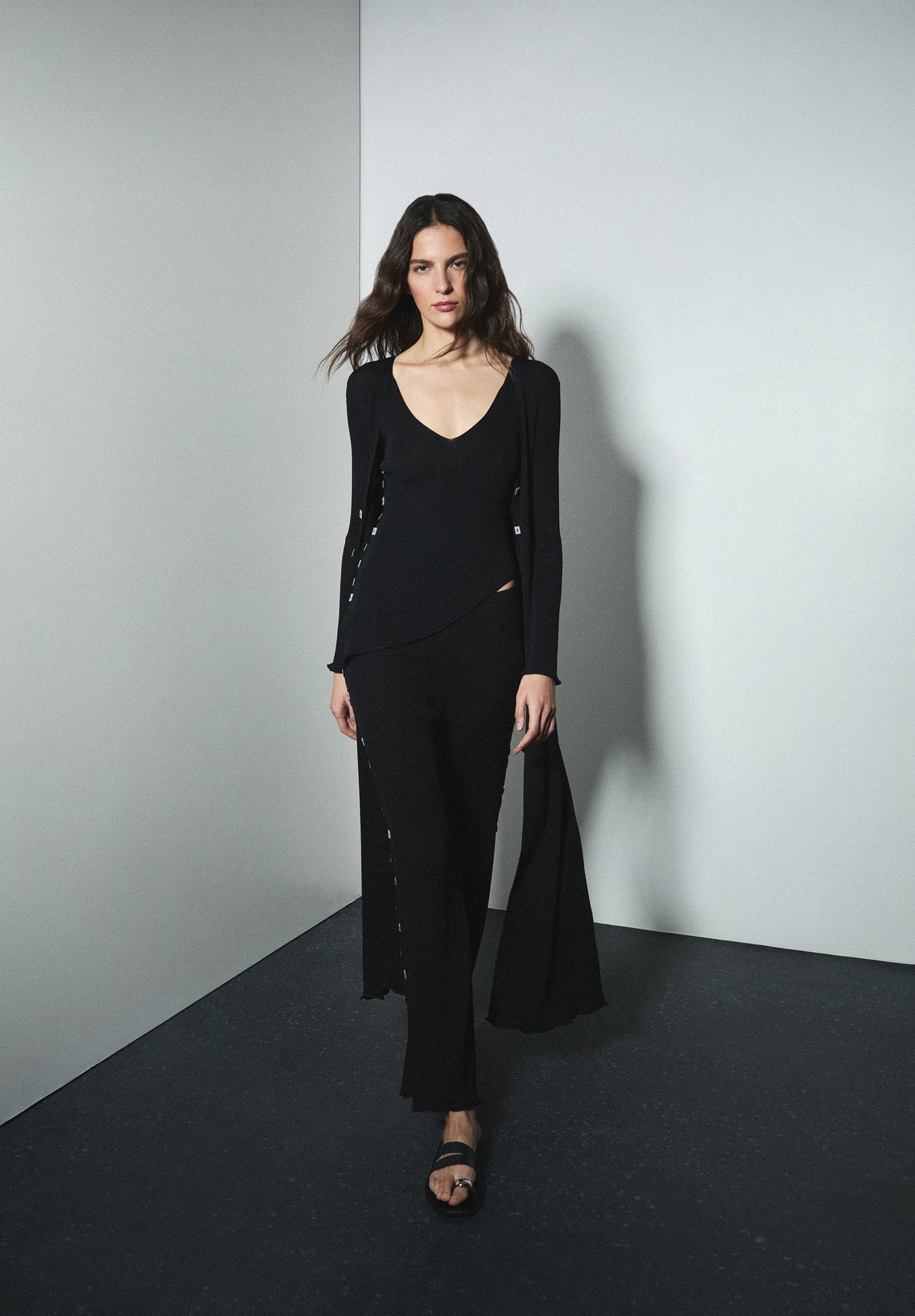 CALÇAS DE MALHA COM APLIQUES LATERAIS