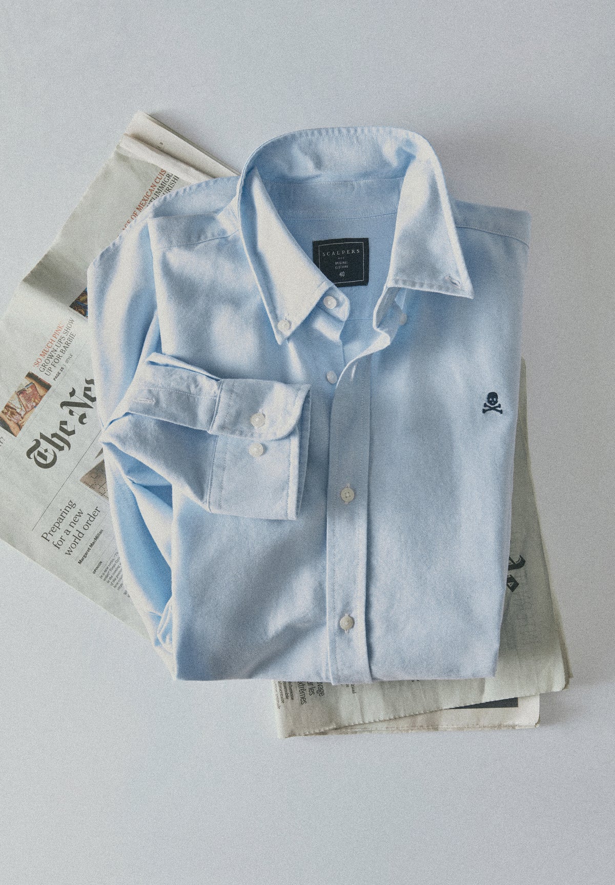 CAMISA OXFORD COM SKULL EM CONTRASTE