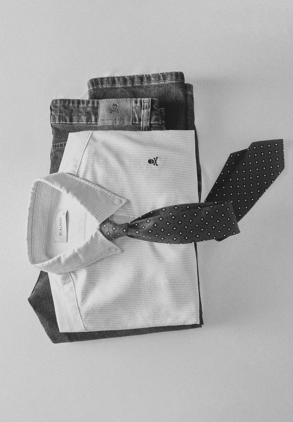 CAMISA OXFORD ÀS RISCAS SKULL
