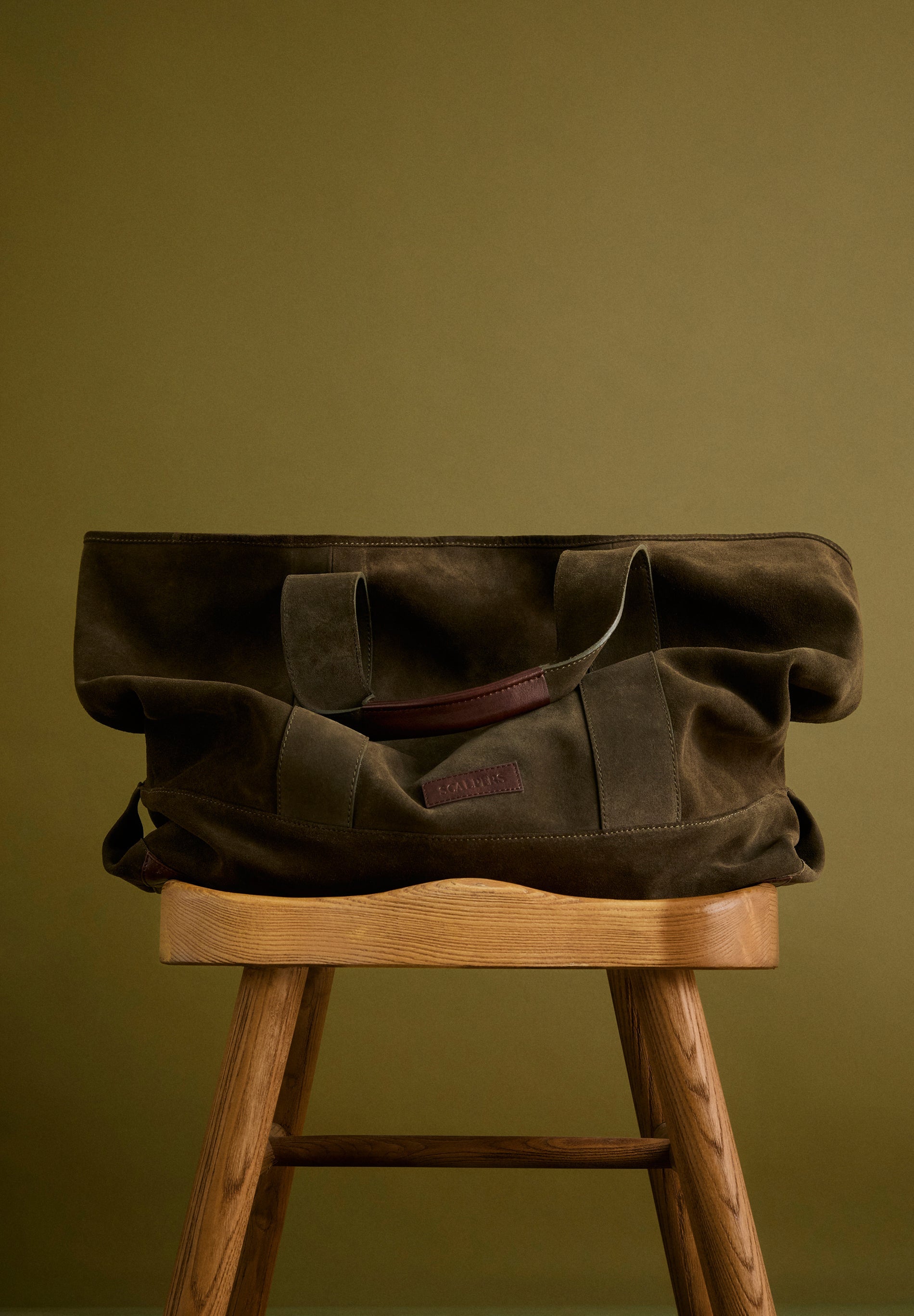 BOLSA DE CAMURÇA EM PELE