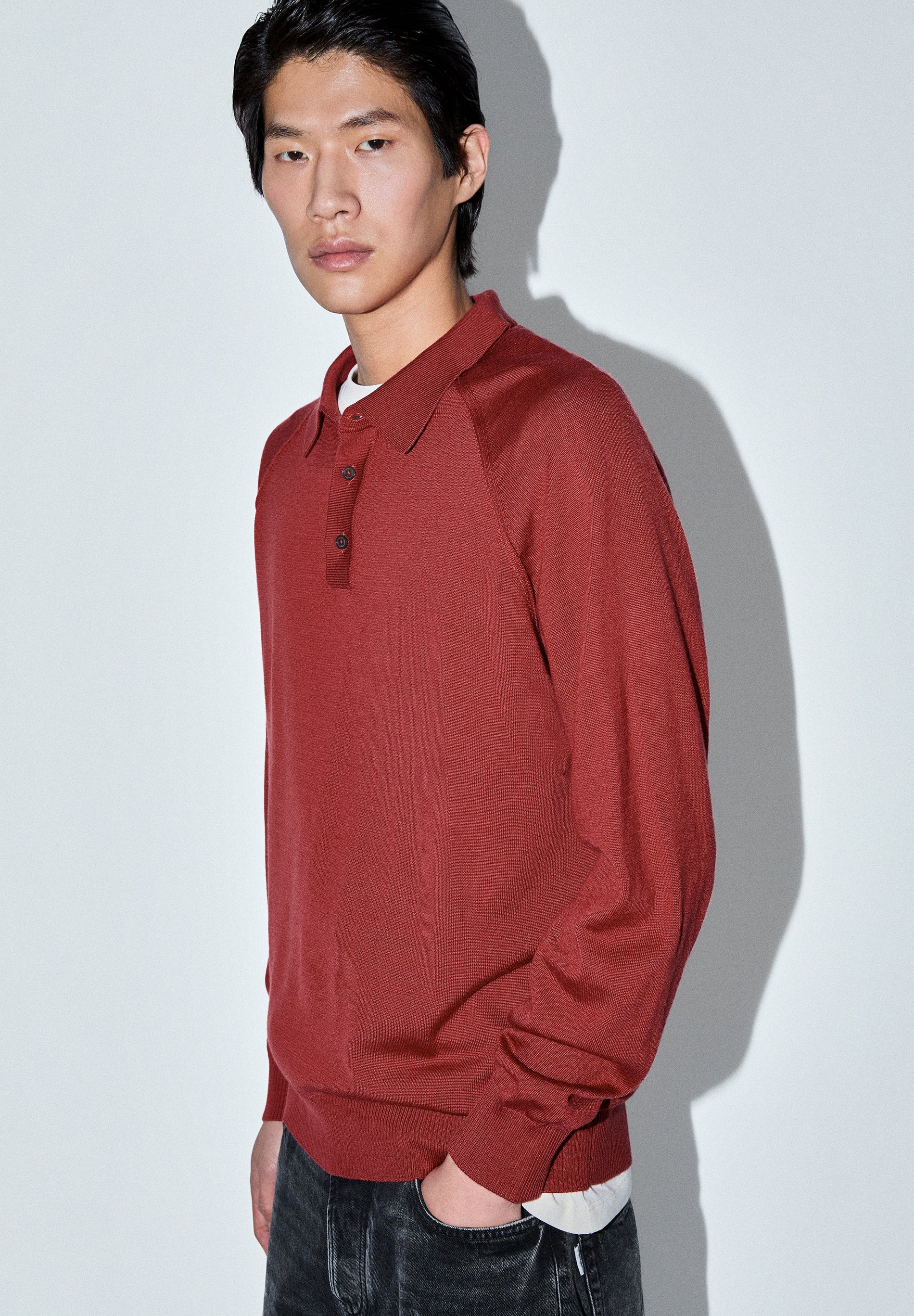 SWEATER COM TIPO CAMISA POLO RAGLÃ