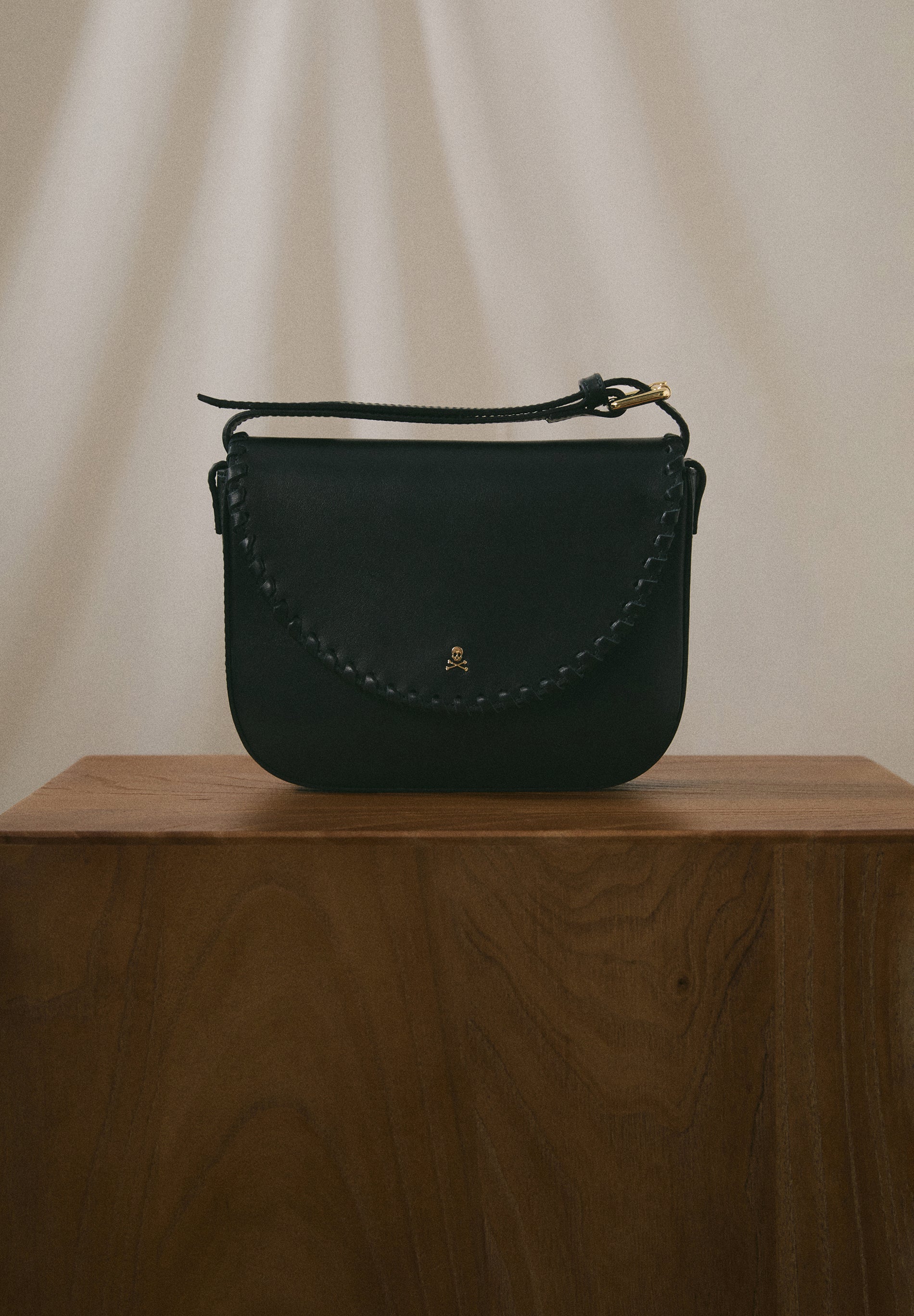 BOLSA A TIRACOLO EM PELE ENTRANÇADA