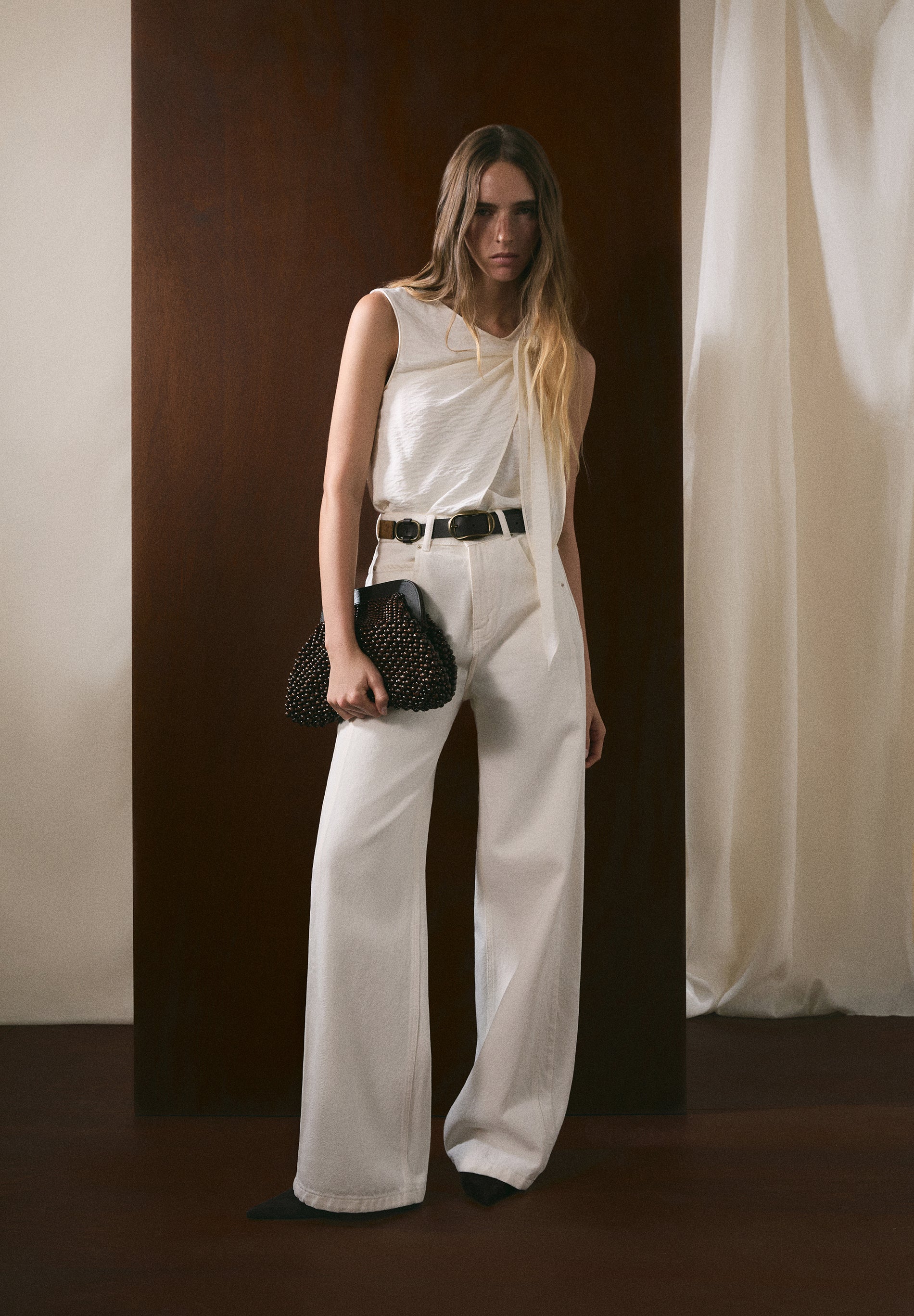 JEANS COM COSTURA EM CONTRASTE